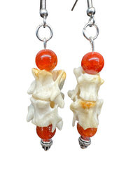 Skunk Vertebrae Earrings with Orange Beads